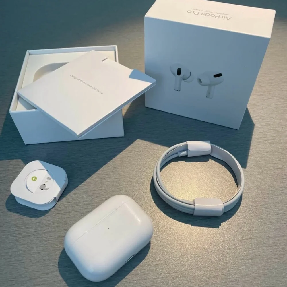 Apple AirPods Pro with White Charging Case and Accessories